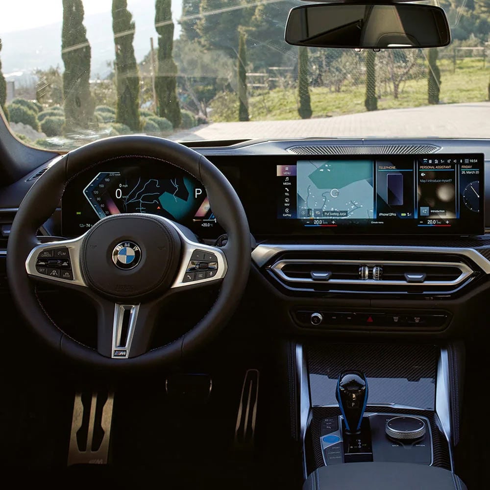 A driver's eye view of steering wheel and controls of the BMW i4 | Open Road BMW of Edison in Edison NJ