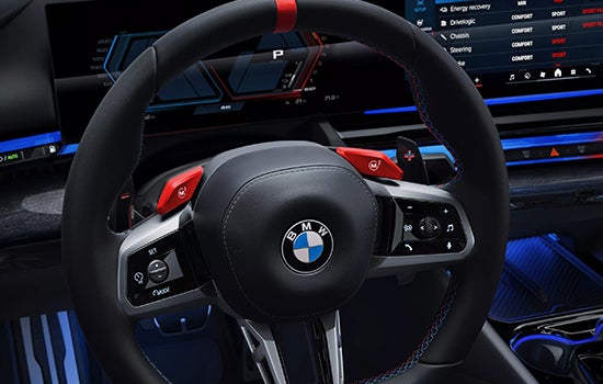 Close-up view of BMW M5 Touring steering wheel. | Open Road BMW of Edison in Edison NJ