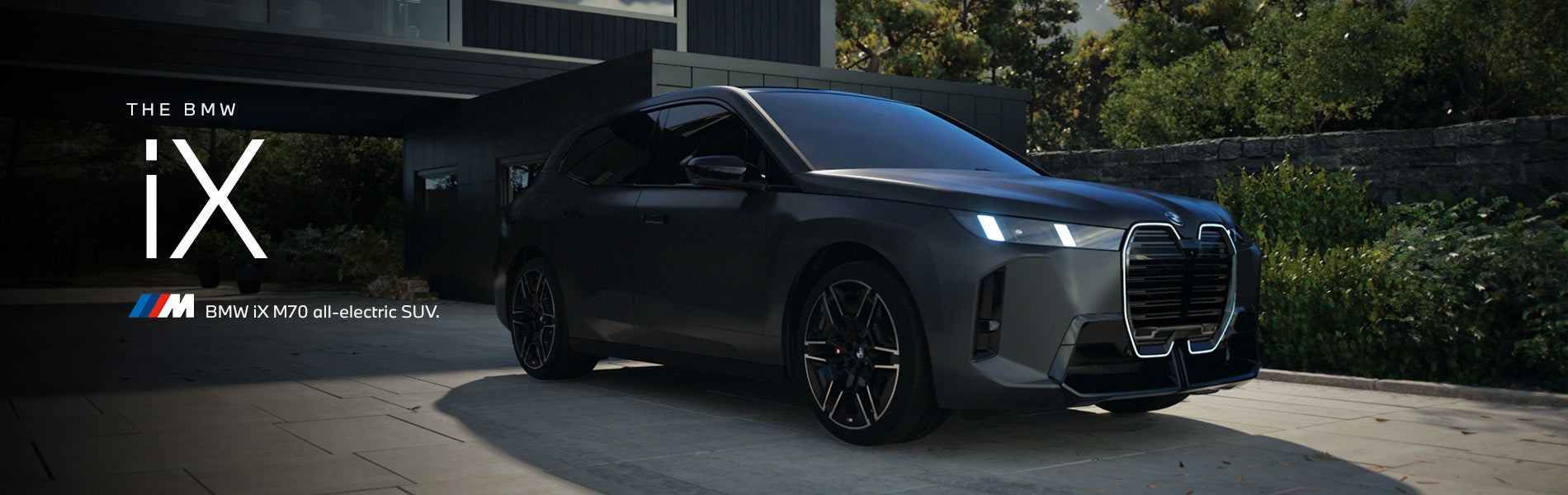 The BMW iX M70 parked. Click to learn more. | Open Road BMW of Edison in Edison NJ