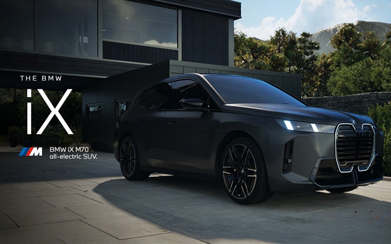 The BMW iX M70 parked. Click to learn more. | Open Road BMW of Edison in Edison NJ