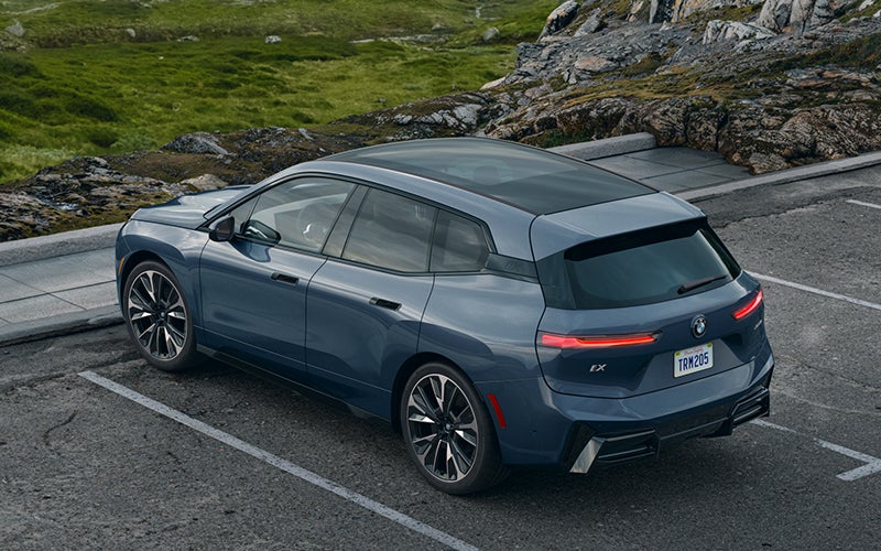 The BMW iX parked in a parking spot. | Open Road BMW of Edison in Edison NJ