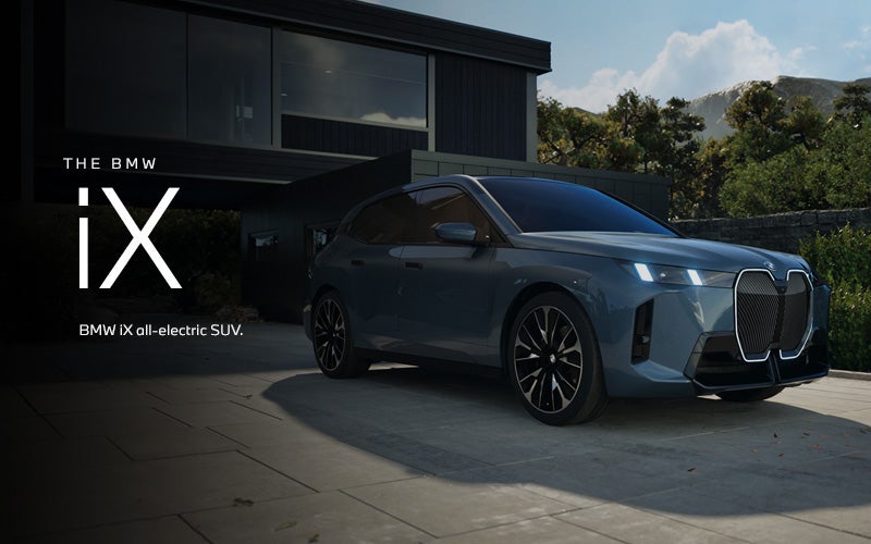 The BMW iX SUV parked. Click to learn more. | Open Road BMW of Edison in Edison NJ