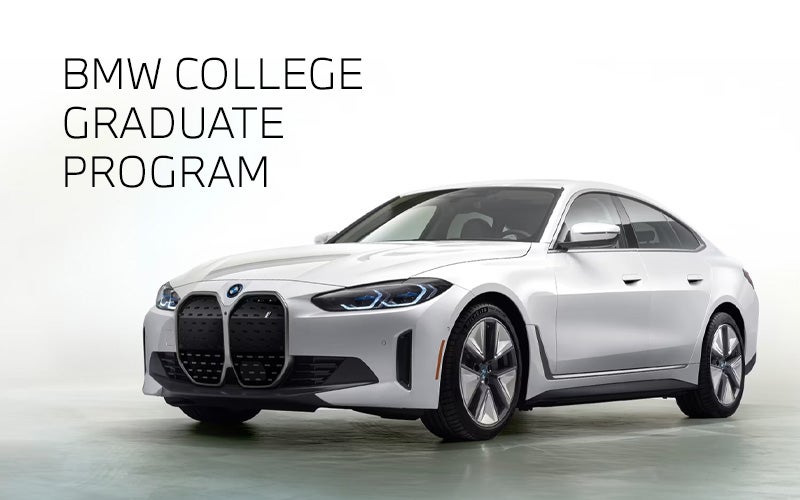 White BMW i4 parked. BMW College Graduate Program. | Open Road BMW of Edison in Edison NJ